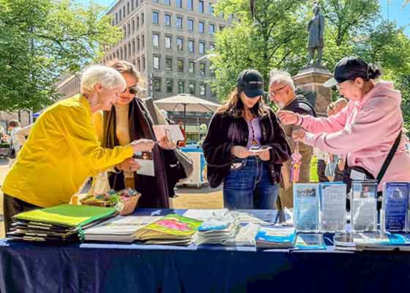 Image for article Finlandiya: Helsinki Şehrinin Kuruluşunun 65'inci Günü'nde Falun Dafa Kamuoyuna Tanıtıldı