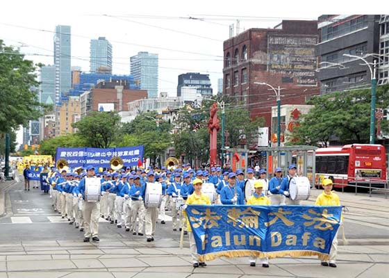 Image for article ​Toronto: Düzenlenen Miting ve Geçit Töreniyle ÇKP'yi Reddeden 430 Milyon İnsan Kutlandı