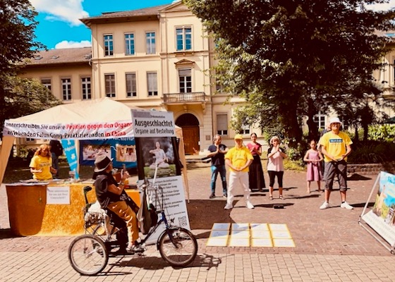 Image for article Almanya: Heidelberg'deki Etkinlikte Halk, Falun Gong'a Yönelik 25 Yıllık Zulmü Kınadı