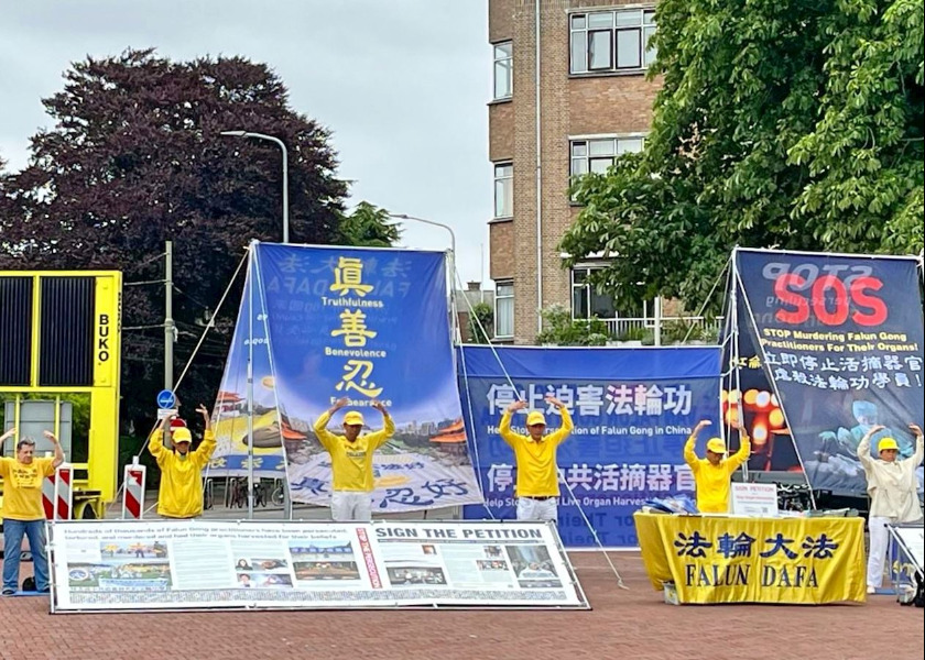 Image for article Falun Gong Uygulayıcıları Hollanda'daki NATO Zirvesi Sırasında Süregelen Zulüm Konusunda Farkındalık Yarattı