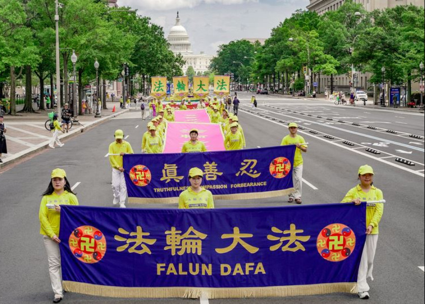 Image for article ​Washington DC: İzleyenler, Çin’de Yaşanan Zulmün 26. Yılında Falun Gong Yürüyüşünü Övdü
